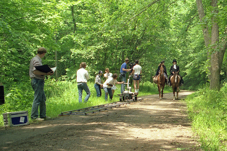 Shooting the "dappled sunlight" scene where Margaret Campbell (Allison Gregory) soothes Alexander's (Paul Mercier) upset about public reaction to his message. L>R, Tom Tillisch (script suprervisor/AD). Jerry L. Jackson (writer/director/producer), Kevin Cable (DP).  From the award-winning drama, WRESTLING WITH GOD.